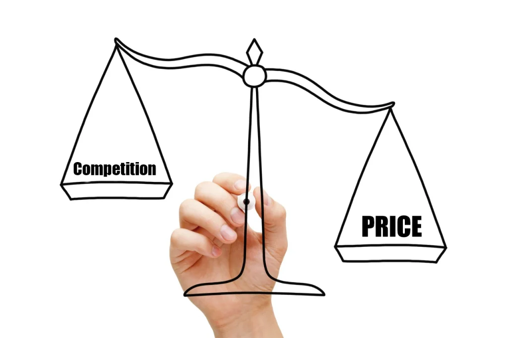 a hand drawing a weighing scale, side has the Price and other side side has the Competition
